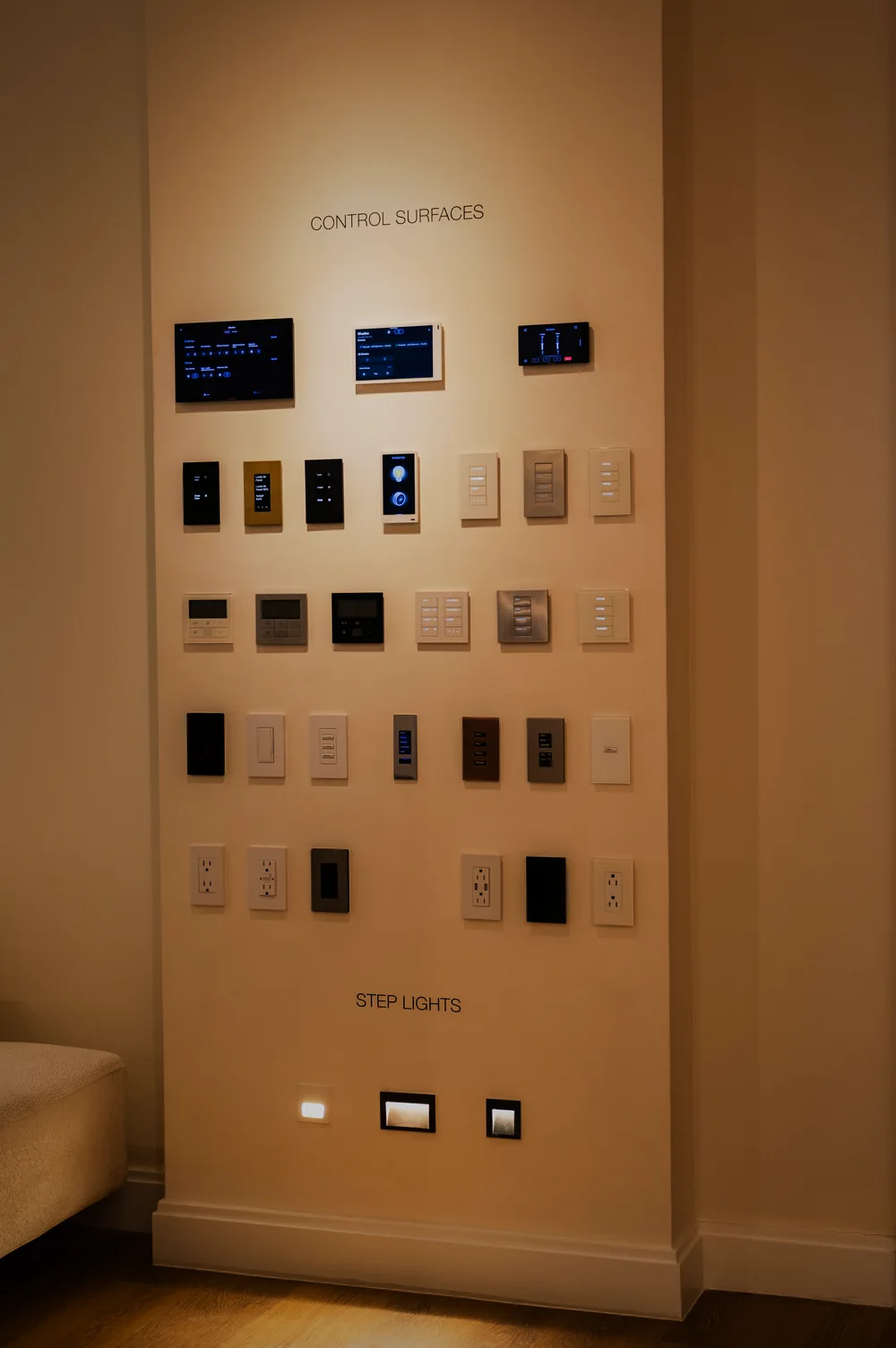 Lutron and Crestron control surfaces wall